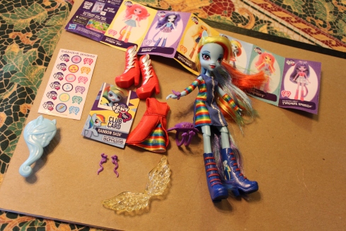 Rainbow Dash (who I forgot to photograph after this point) with her multiple accessories.